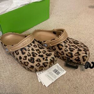 Brand new with tags. Never worn. Cheetah crocs women’s size 7